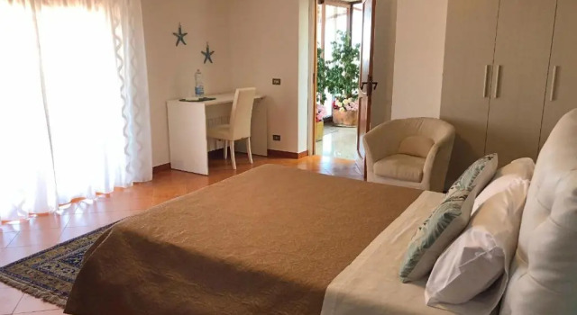 Deluxe værelse I Faraglioni B&B