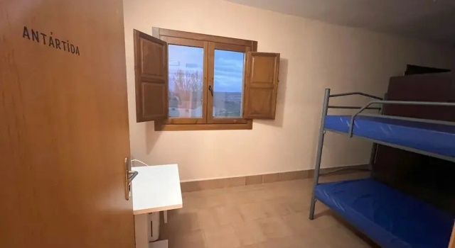 Кровать в общем номере Ikigai Albergue
