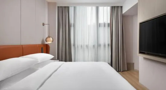 Капсула Home2 Suite by Hilton Wuhan Economic Development Zone