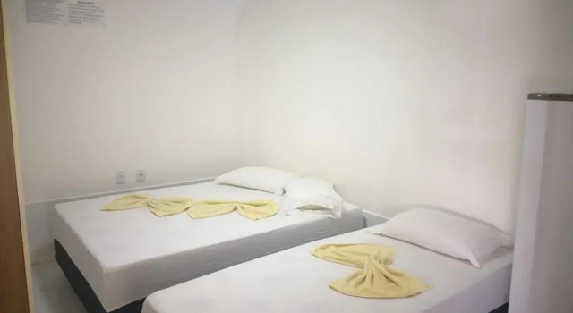 Четырёхместный номер Standard с балконом и с красивым видом из окна Hotel Pousada Aquarius SOB NOVA DIREÇÃO