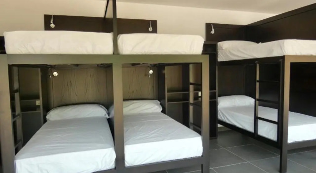 Кровать в общем номере Albergue Casa Sueño