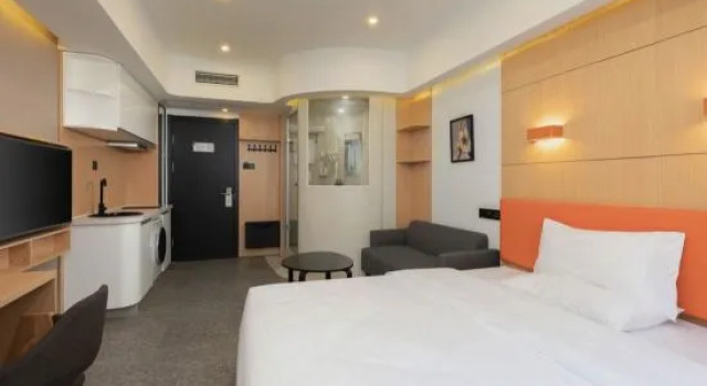 Семейный люкс с 2 комнатами Dalian full stop hotel