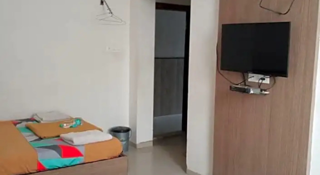 Четырёхместный номер Deluxe с красивым видом из окна Hotel Malhar Palace