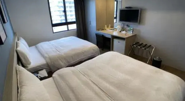 Ekonomiczny czteroosobowy pokój Taichung Saint Hotel