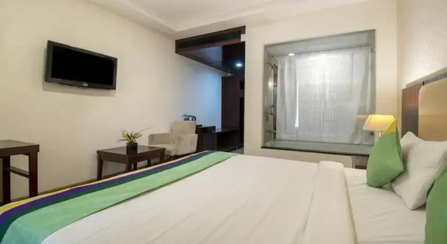 Treebo Trend Grenville near Udyog Vihar, Забронировать Отель Гургаон Gurgaon Region, рядом с Motorola Solutions India