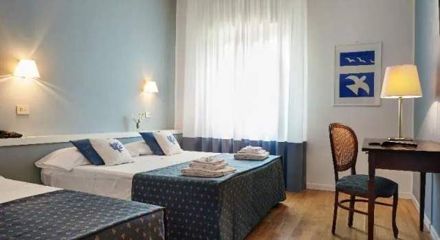 Четырёхместный номер Standard с балконом Hotel Punta Nord Est