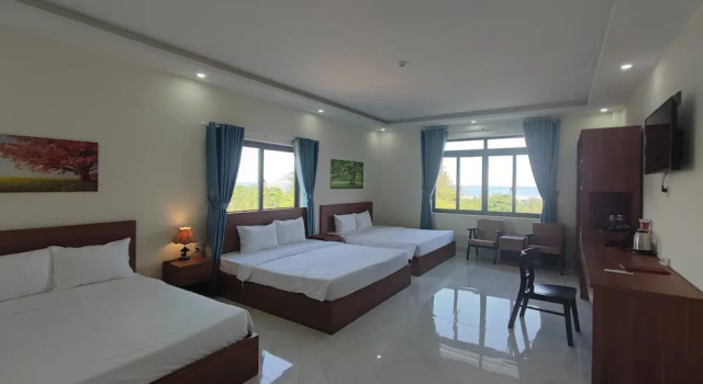 Кровать в общем номере Hoàng Anh Côn Đảo Hotel