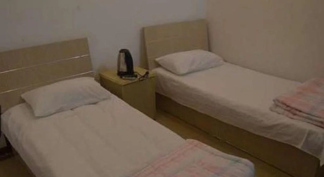 Qingdao Guanglongju Inn, Забронировать Отель Shibei District Циндао