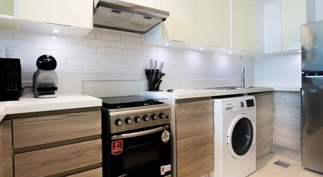 Апартаменты Chic 1BR Iris Amber Al Jaddaf
