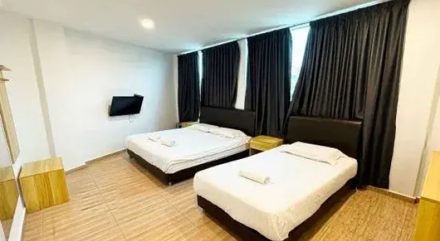 Třílůžkový Apartmá OYO 89493 Q Hotel Mentakab