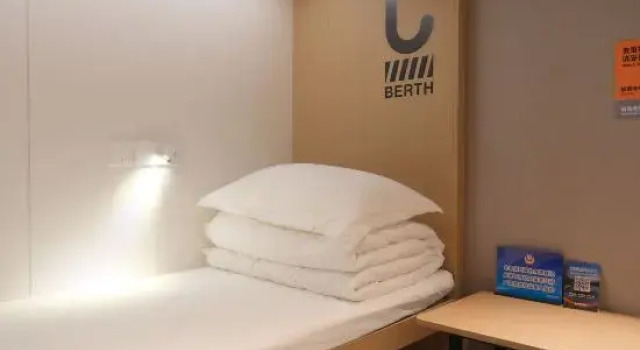 Кровать в общем номере (женский номер) wohkoon zhexingsun Youth Hostel（beijingniaochaoaosengongyuandian）