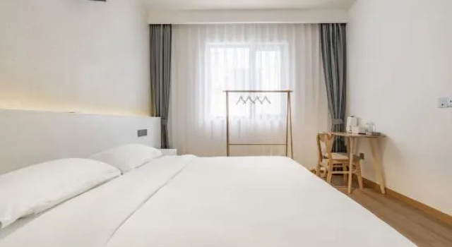 Кровать в общем номере с 4 комнатами Yunshang grassland anjimamba B & B