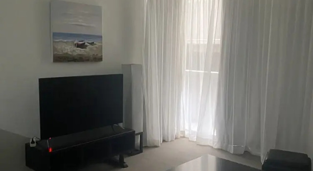 Апартаменты с 2 комнатами с балконом и с частичным видом Curtis Central Apartments Official