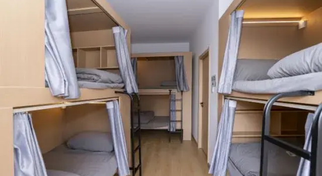 Кровать в общем номере Qinglan International Youth Hostel (Zhengyifang Shopping Center)