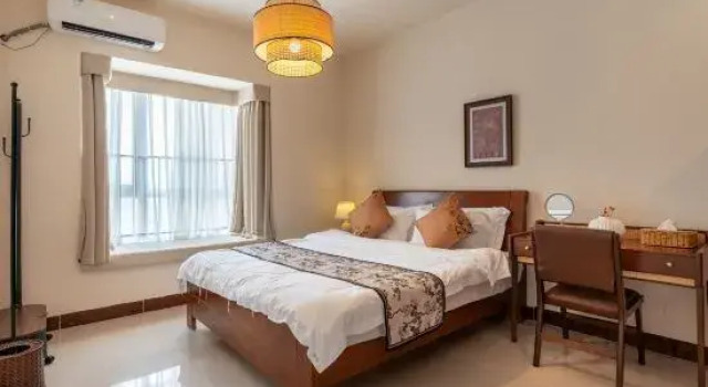 Люкс с 4 комнатами Ludao Designer Hostel (Provincial Museum & Riyue Square Duty Free Shop)