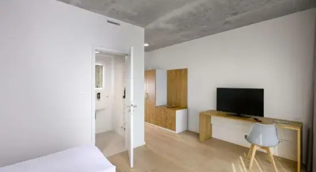 3 soveværelser i standard- på øverste etage værelse DownTown Suites Andel