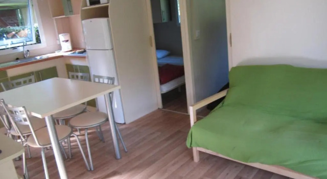 Кровать в общем номере с 3 комнатами Camping Le Colporteur