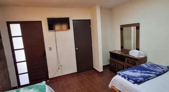 Четырёхместный номер Comfort La Cabaña Hotel