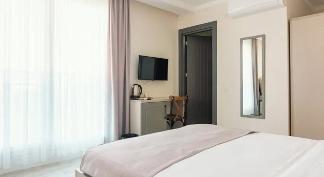 Трёхместный номер Standard с балконом и с частичным видом на море Koi otel