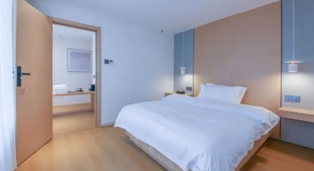 Семейный люкс Tianhao Lantu Hotel (Wulong Railway Station)