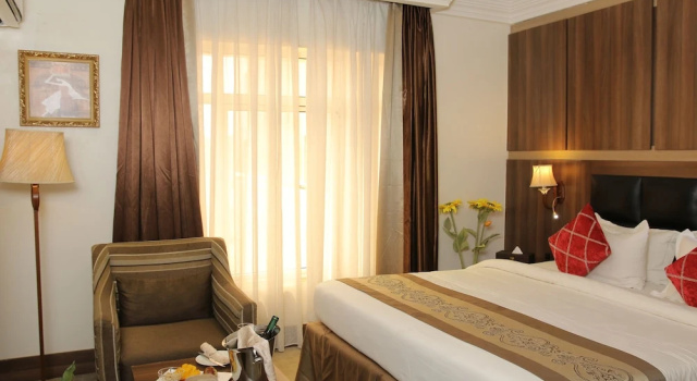 Номер Classic Grand Pela Hotels & Suites