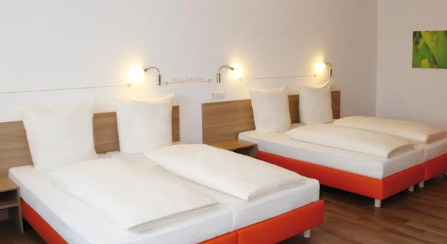 Четырёхместный номер Standard Orange Hotel und Apartments