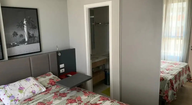 Quarto e Sala Particular em Aparthotel