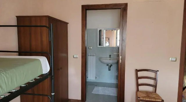 Кровать в общем номере Locanda Francescana