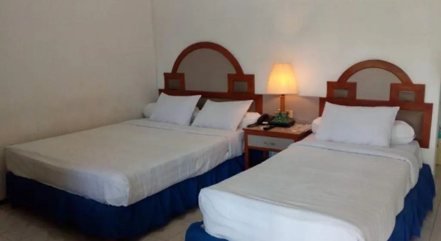 Executive Dreier Zimmer Berlian Abadi Hotel by Sinergi