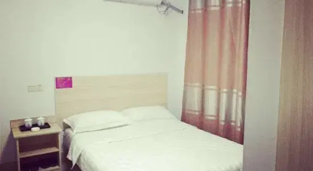 Номер Economy Mengyin Taoyuan Hotel