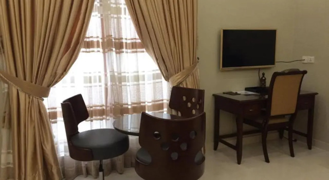 Camera Executive Orchards Cottage hotel