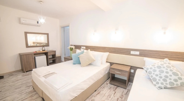 Трёхместный номер Standard Madda Hotel