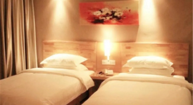Jingtong Business Hotel Yulin Chengxi, Varaa Hotelli Yulin Guangxi