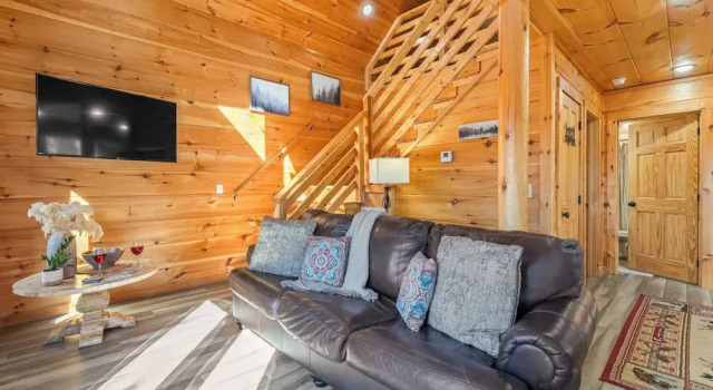 Hot Tub, Game Loft, Open Living, Minutes to Downtown Gatlinburg Whisper Cabin by Avantstay