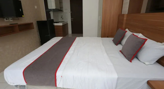 Deluxe Double room Collection O metroploitian park Serviced Apartmen