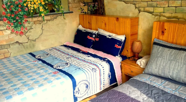 Четырёхместный номер Standard с балконом Wanderlust Saigon Hostel