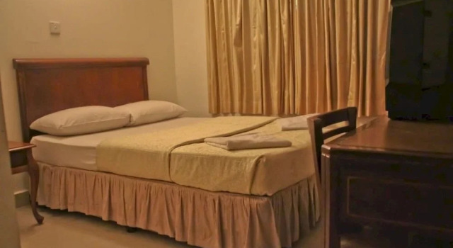 Macktz Comfort Inn - Grand Crescent, Забронировать Отель Брикфилдс Куала-Лумпур