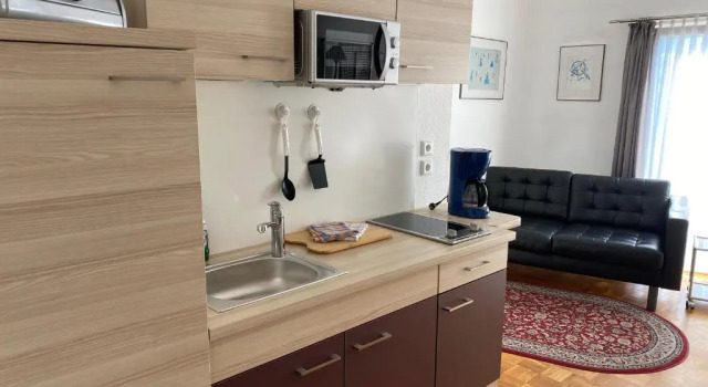 Студия Apartmenthaus Zentrum Komfort Apartments mit Miniküchen verschiedener Größen