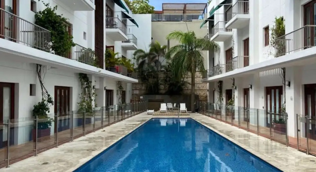 w Welcoming 1BR in Cartagena, Забронировать Апартаменты/квартира Отели Картахены с парковкой, рядом с Bolivar Park, Парковка
