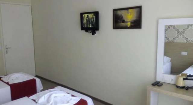 Кровать в общем номере Nicea Hotel