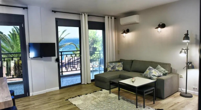 Апартаменты Cos Seafront Apartments