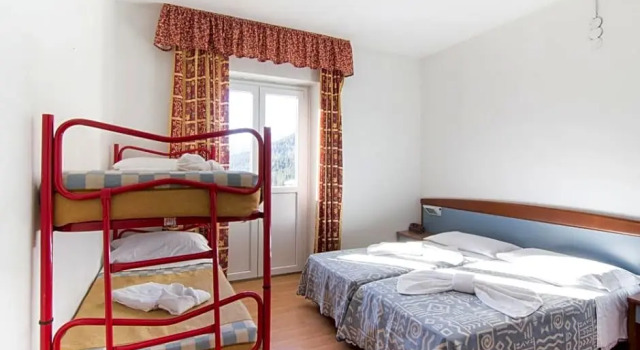 Четырёхместный номер Standard Hotel Excelsior Cimone