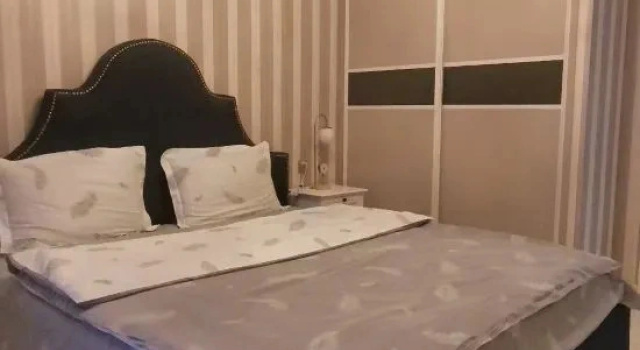 Четырёхместный семейный люкс Deluxe c 1 комнатой Meichao Apartment