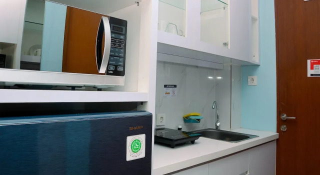 Апартаменты Relaxing Studio at Tifolia Apartment