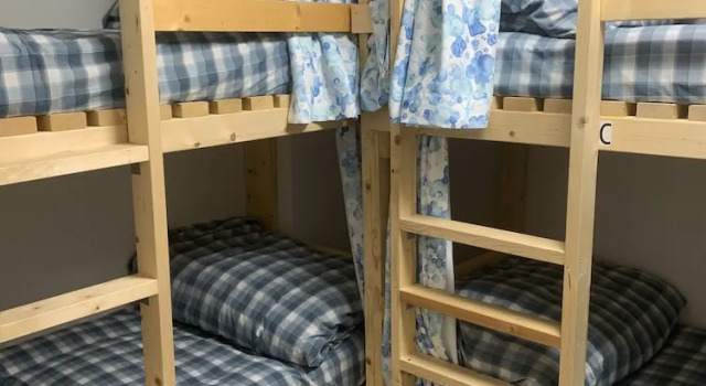 Кровать в общем номере GUEST HOUSE TOKAI nagaragawa RENTAL CAR