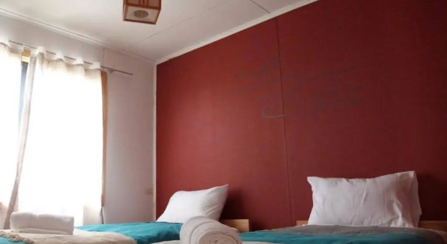 Hostal Morocha, Забронировать Отель Пуэрто-Наталес область Магальянес, рядом с Yungay Square