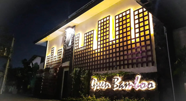 Кровать в общем номере DBamboo Suites