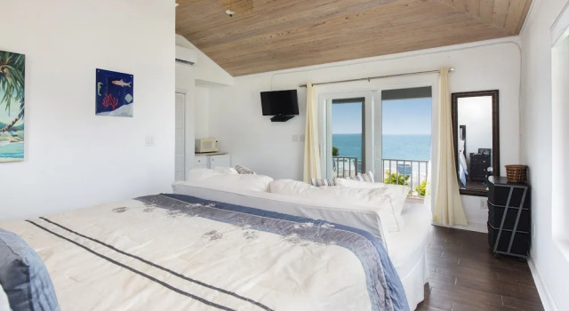 Neptune Cove 5 Bedroom Home, Boek Vakantiehuis Hotels in Rainbow Bay met parkeren, Parkeren