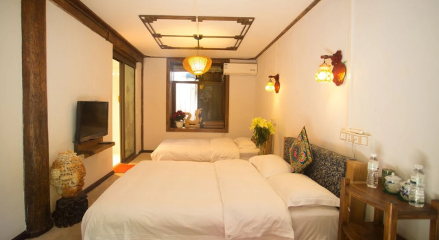 Lijiang Tianlong Inn, Забронировать Отель Лицзян Юньнань, рядом с Улица Сквер-стрит Древнего города Даянь