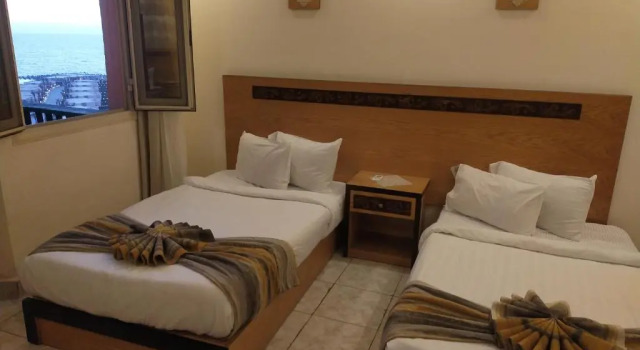 Апартаменты с 3 комнатами с видом на море 26th of July Apartments